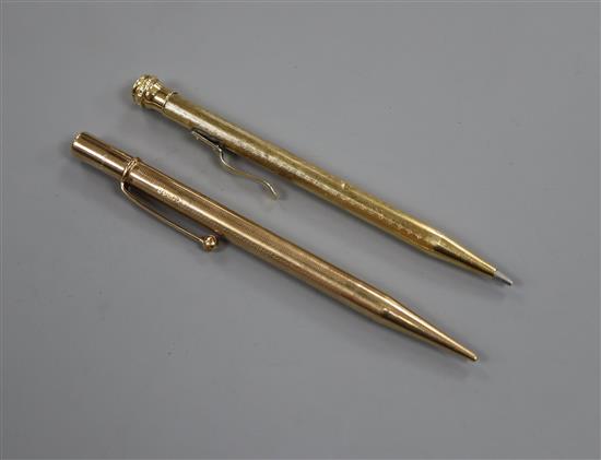 A 9ct gold cased pencil and a 585 cased pen.